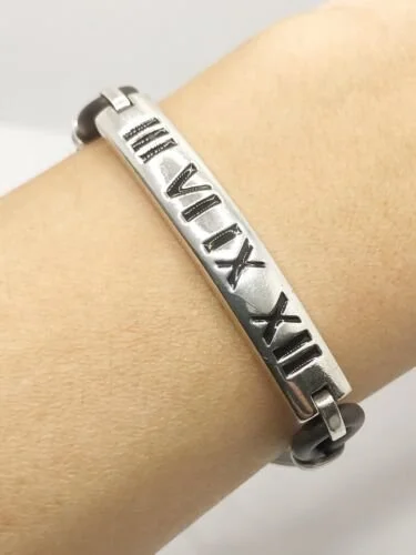 Tiffany & Co. SS 2003 Atlas Enamel Numeral Surfer Groove Rubber